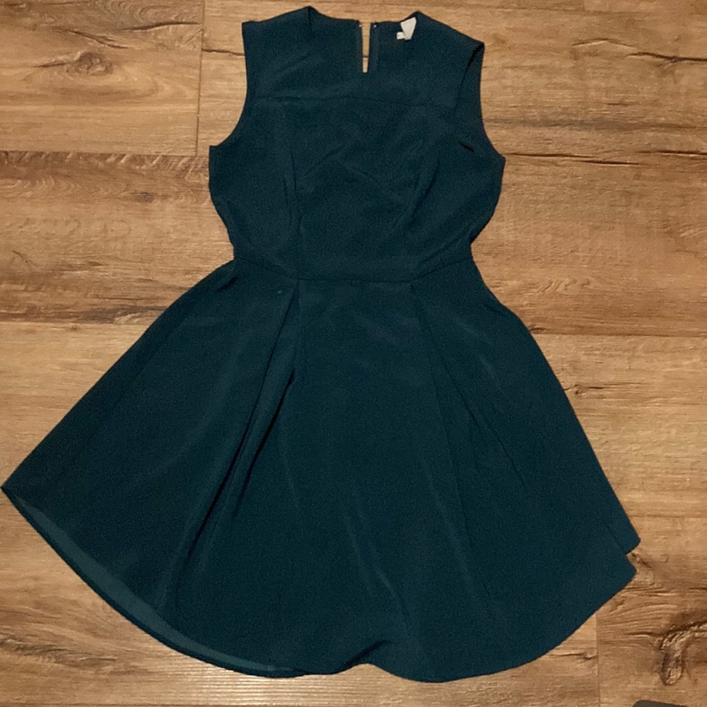Mini forest green dress good for church or a simi formal dance with ruffles